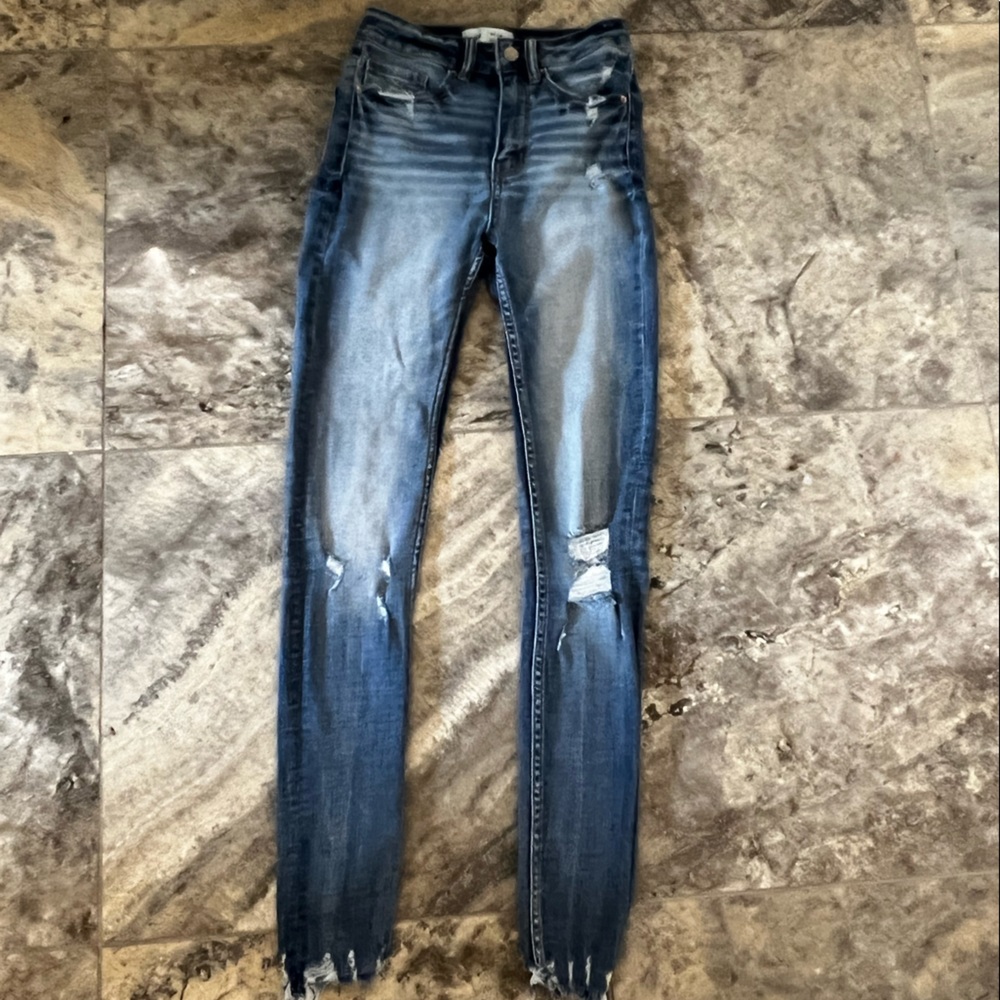 Buckle high waisted skinny jeans